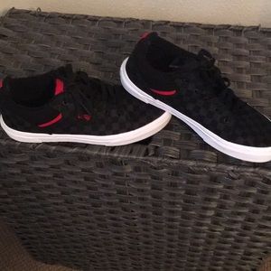 Black and red checkerboard vans.  Big kid size 5 fits women size 7